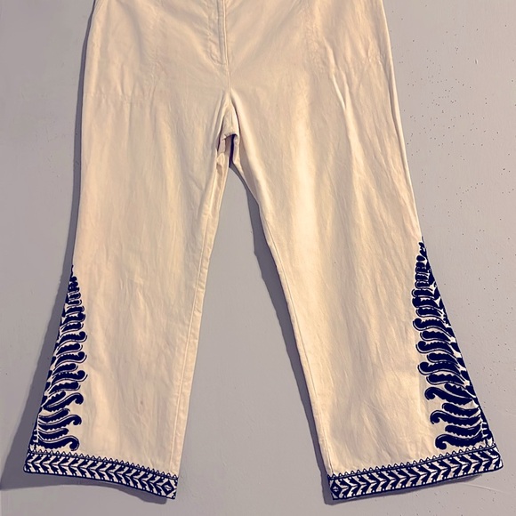 Tory Burch cream bell bottoms embellished with BLACK beads & BLACK embroidery